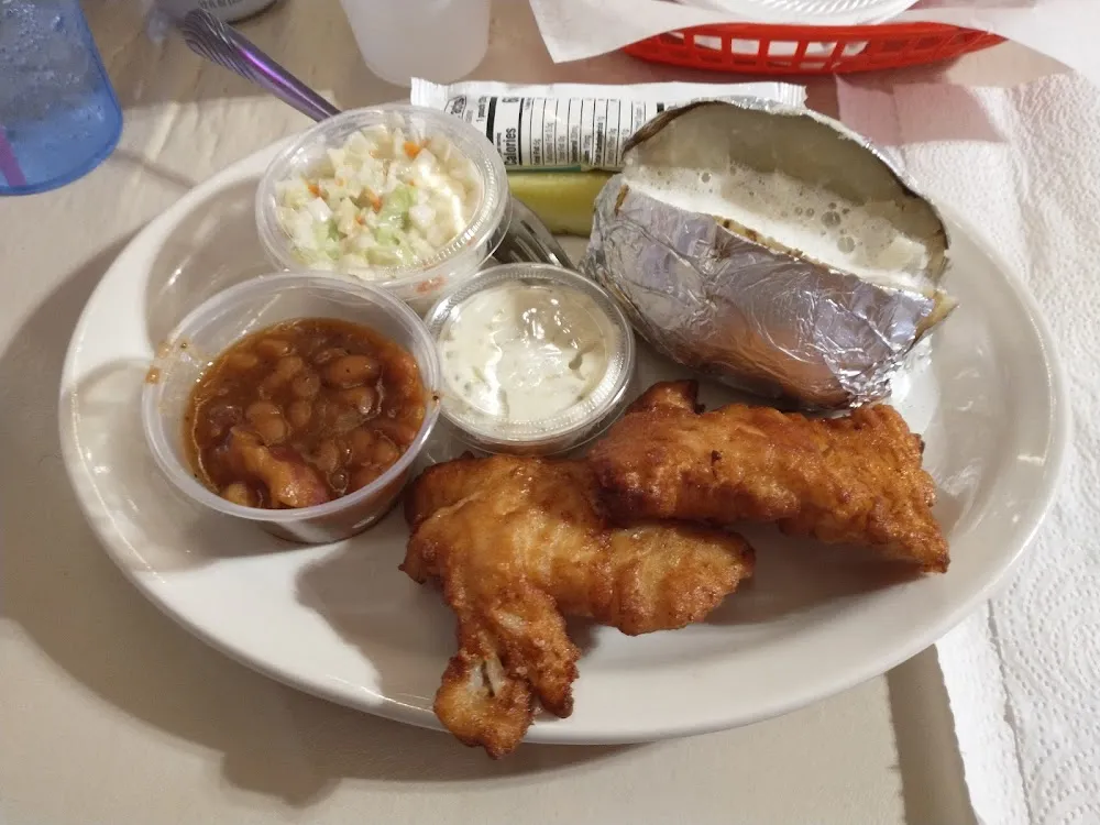 Friday Fish Baked Potato Baked Beans Coleslaw Tartar Sauce Butter Sour Cream Pickles